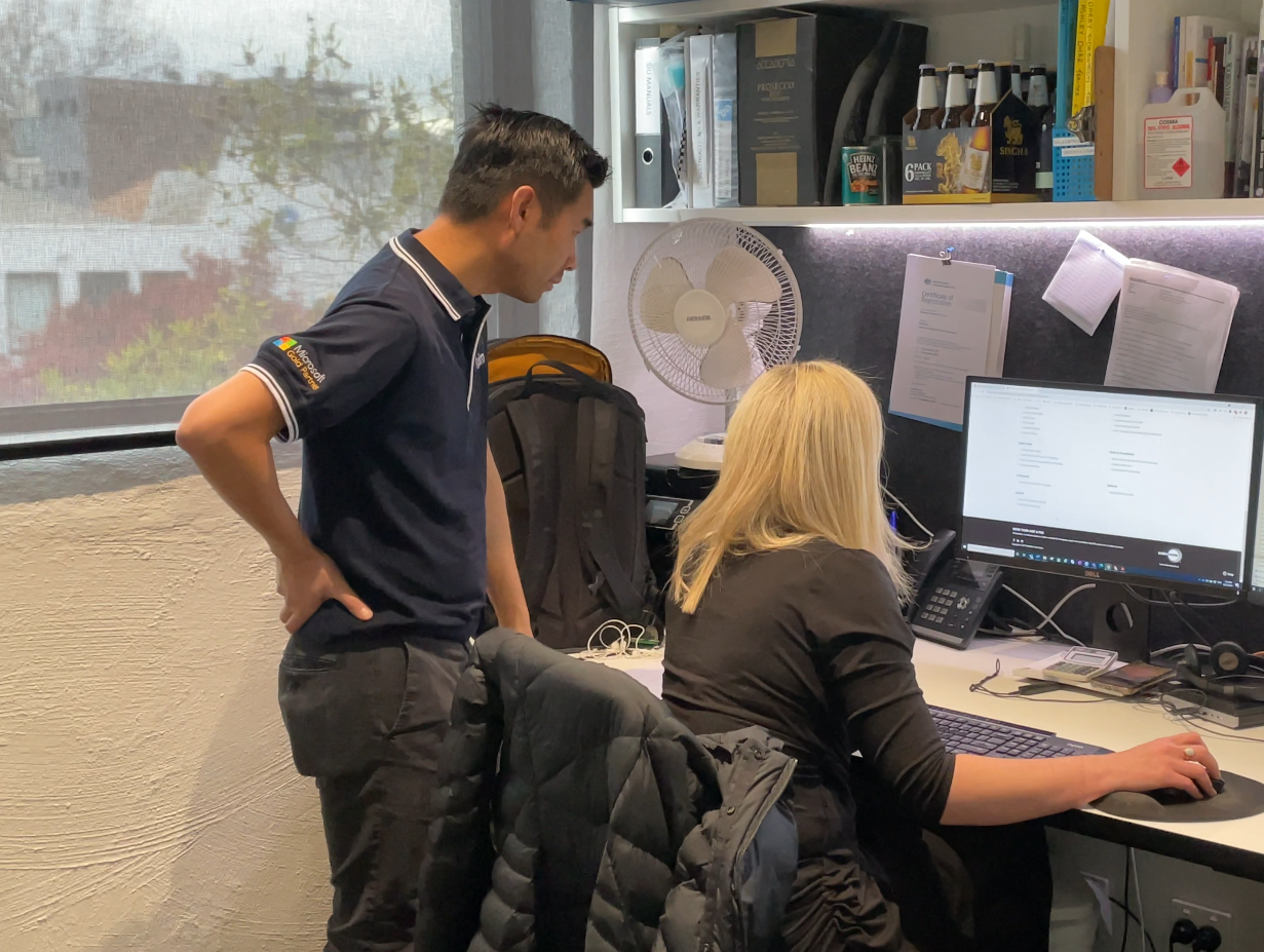 Axiom IT team helping a client