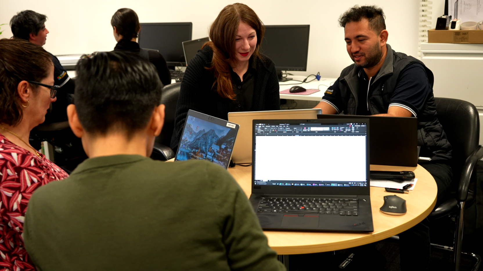 Axiom IT team collaborating with client